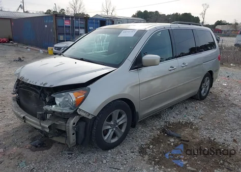2008 Honda Odyssey Touring z USA, uszkodzony, nr VIN 5FNRL38978B004224